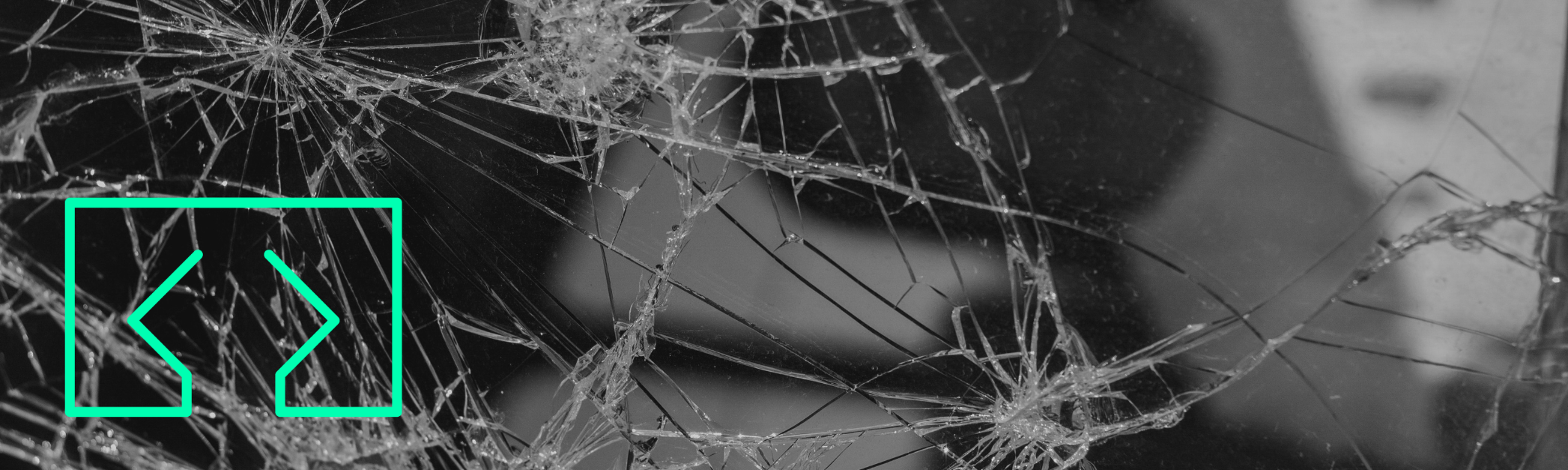 broken glass with green web development agency icon